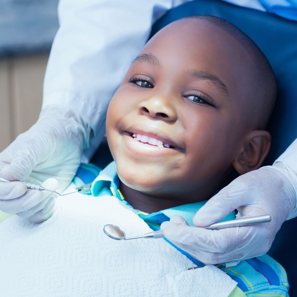 kid-smiling-at-the-dentist
